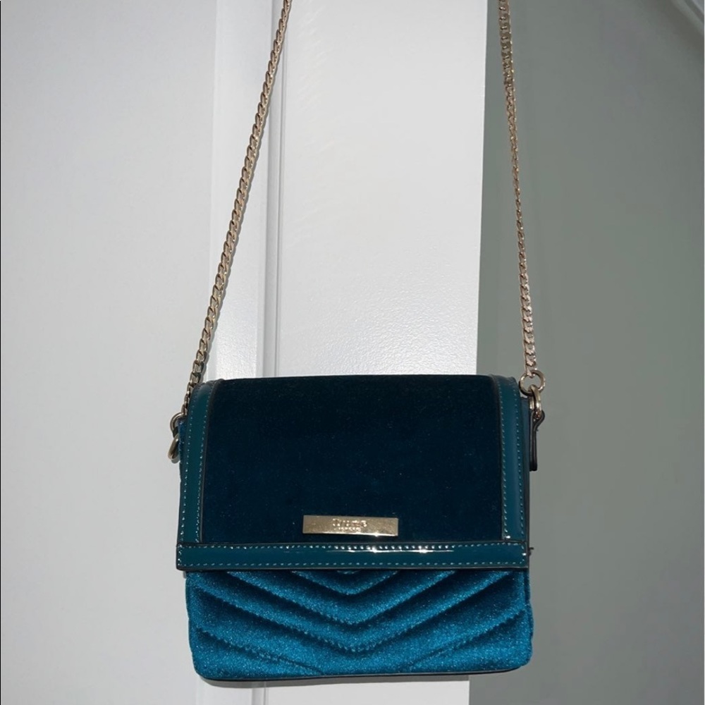 Like new Teal color crossbody handbag